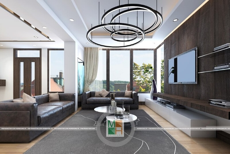 Trang trí nội thất phòng khách chung cư với đồ nội thất sử dụng tông màu veneer trầm mang đến sự trang trọng và hiện đại cho không gian nội thất. tổng hợp các mẫu thiết kế phòng khách ấn tượng và độc đáo