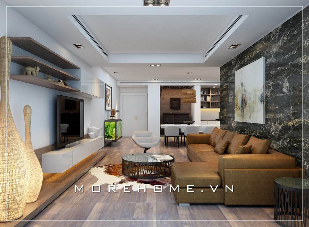 Mẫu thiết kế phòng khách chung cư hiện đại với nôi thất hiện đại: bộ sofa bọc da cao cấp màu nâu sáng, bàn trà mặt đá, kệ ti vi treo, kệ trang trí mang đến không gian sống đầy đủ tiện nghi Phòng khách chung cư hiện đại, đẹp và đẳng cấp