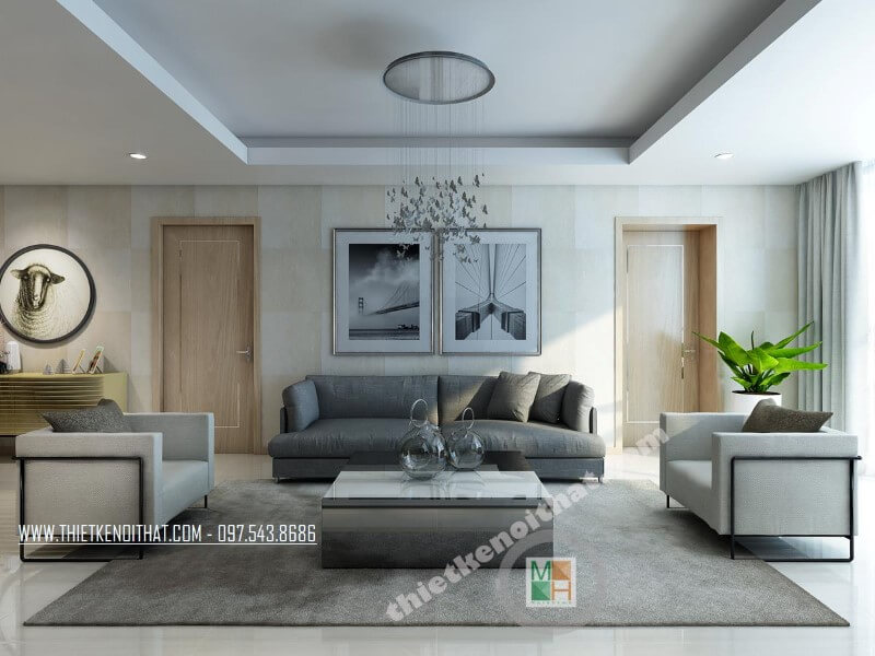 Mẫu thiết kế phòng khách chung cư đẹp với bộ sofa bọc vài màu xám và trắng tạo điểm nhấn nổi bật cho căn phòng. Thiết kế phòng khách