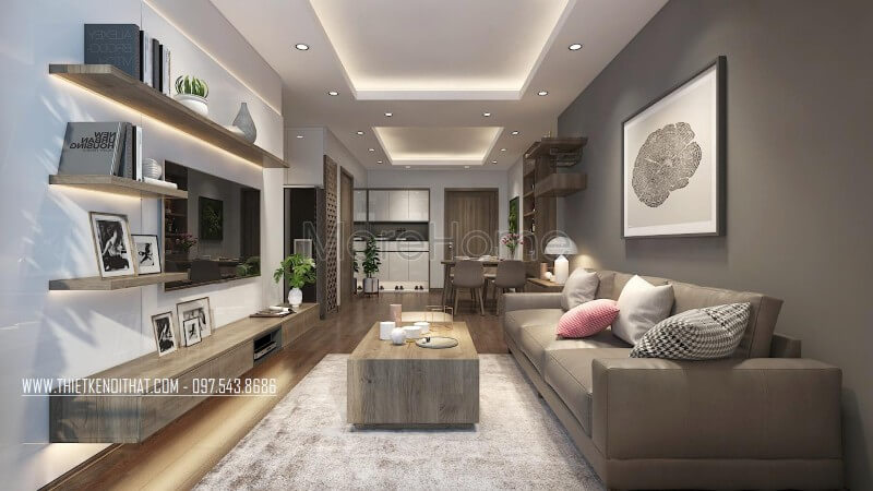 Phòng khách nhỏ được thiết kế tối giản nhưng tiện nghi và sang trọng, gam màu xám làm chủ đạo hài hòa. Thiết kế phòng khách chung cư