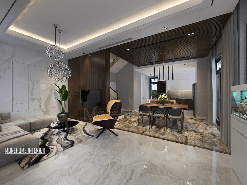 Điểm nhấn ấn tượng giữa gỗ ốp tường cùng đá lát sàn cao cấp tạo nên ánh nhìn hiện đại, cuốn hút cho phòng khách liền bếp ăn. Thiết kế phòng khách liền bếp đẹp, tiện nghi
