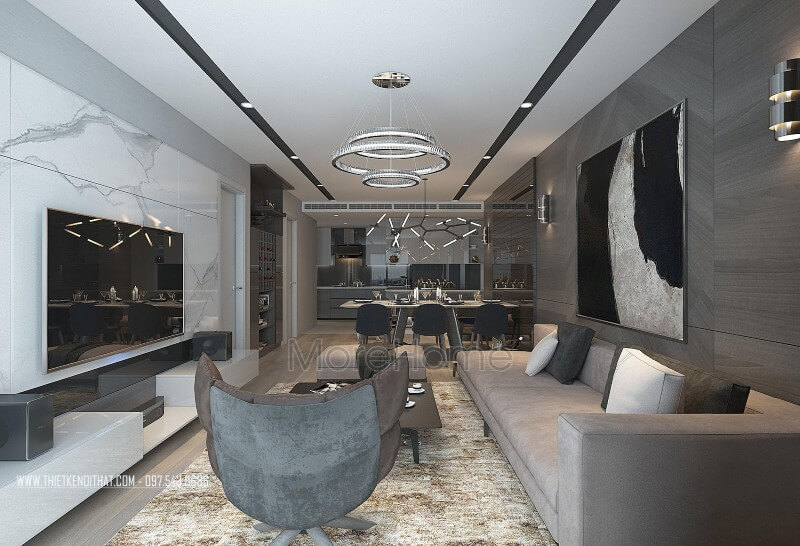 Kệ tivi hiện đại gỗ công nghiệp acrylic bóng gương càng làm cho không gian phòng khách chung cư hiện đại 2 phòng ngủ thêm cuốn hút và sang trọng. Mẫu kệ ti vi phòng khách chung cư bằng gỗ đẹp, ấn tượng