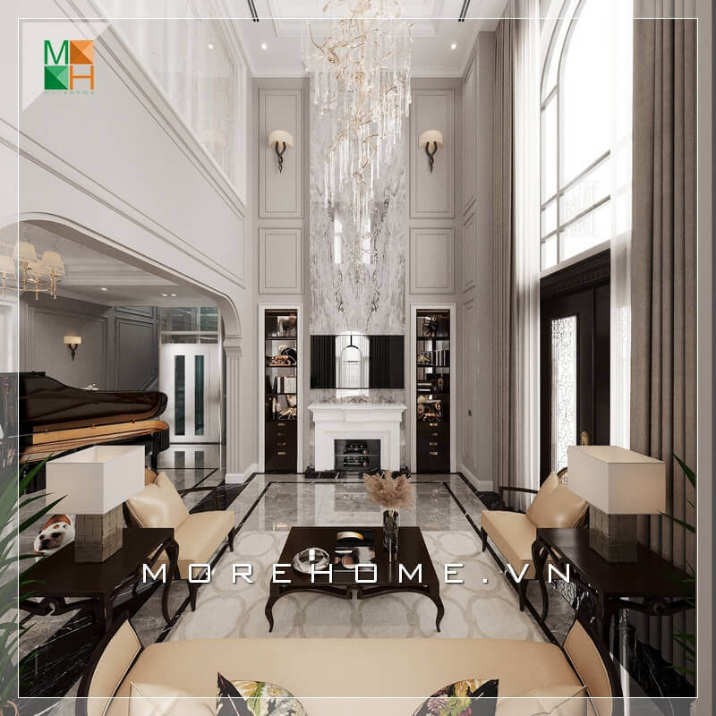 Không gian phòng khách tráng lệ, với mẫu bàn ghế sofa phòng khách sử dụng chất liệu bàn là gỗ tự nhiên cao cấp, ghế sofa bọc da chân ghế sang trọng. Tất cả tạo nên một không gian phòng khách rất hoành tráng và đẳng cấp. Các xu hướng thiết kế phòng khách chung cư tân cổ điển đẹp
